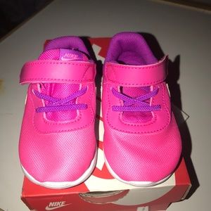 Nike children’s shoes size 5.